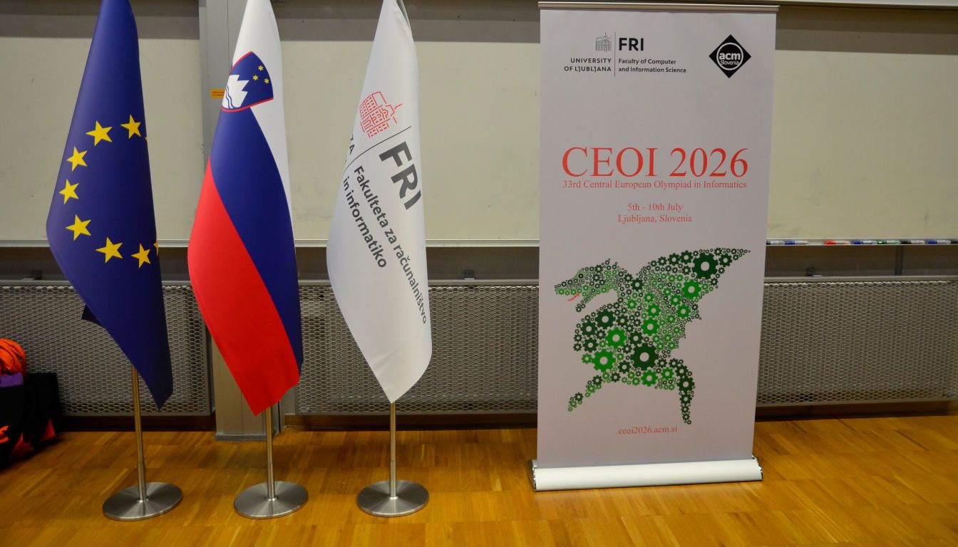 CEOI 2026 banner beside the European, Slovenian and UL FRI flags at the host venue in Ljubljana
